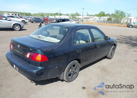 1999 Toyota Corolla Ve from USA, damaged, VIN 2T1BR12E3XC142453